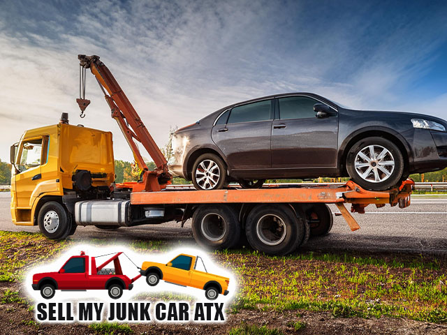 tow truck removing junk car eco friendly