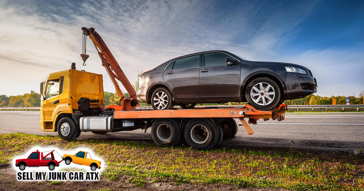 tow truck removing junk car eco friendly